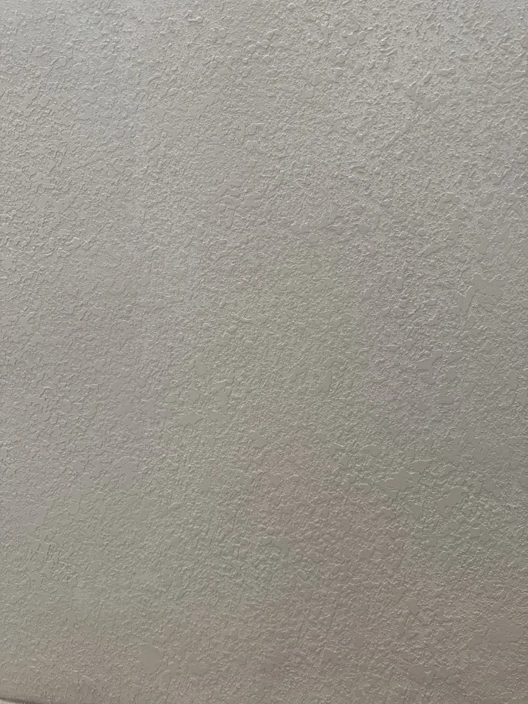 Knockdown texture matching example after drywall repair